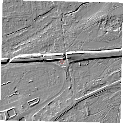 Shaded relief map of the ground around KT108DT, computed from Environment Agency LiDAR. The ground here sits at about 12 m above sea level and falls 10 m across the surrounding 800 m. Surface water reaching this point runs off ground lying to the north-north-west, 5.8 m higher.