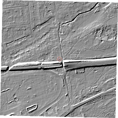 Shaded relief map of the ground around KT108DY, computed from Environment Agency LiDAR. The ground here sits at about 12 m above sea level and falls 10 m across the surrounding 800 m. Surface water reaching this point runs off ground lying to the south, 6.4 m higher.