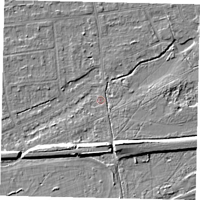 Shaded relief map of the ground around KT108DZ, computed from Environment Agency LiDAR. The ground here sits at about 11 m above sea level and falls 10 m across the surrounding 800 m. Surface water reaching this point runs off ground lying to the south, 7.4 m higher.