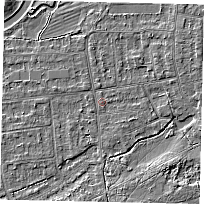 Shaded relief map of the ground around KT108ER, computed from Environment Agency LiDAR. The ground here sits at about 11 m above sea level and falls 4 m across the surrounding 800 m. Surface water reaching this point runs off ground lying to the west-south-west, 2.9 m higher.