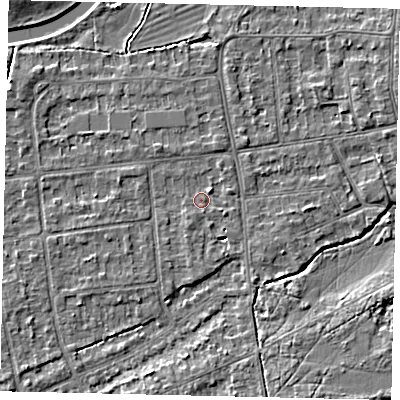 Shaded relief map of the ground around KT108EX, computed from Environment Agency LiDAR. The ground here sits at about 11 m above sea level and falls 4 m across the surrounding 800 m. Surface water reaching this point runs off ground lying to the north-east, 1.4 m higher.