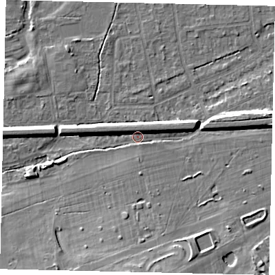 Shaded relief map of the ground around KT108HB, computed from Environment Agency LiDAR. The ground here sits at about 12 m above sea level and falls 10 m across the surrounding 800 m. Surface water reaching this point runs off ground lying to the south, 8.8 m higher.
