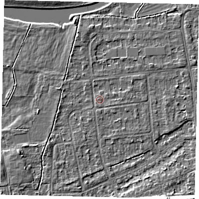Shaded relief map of the ground around KT108HN, computed from Environment Agency LiDAR. The ground here sits at about 11 m above sea level and falls 9 m across the surrounding 800 m. Surface water reaching this point runs off ground lying to the south-east, 0.6 m higher.
