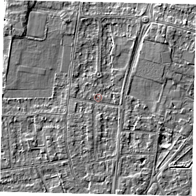Shaded relief map of the ground around KT108JG, computed from Environment Agency LiDAR. The ground here sits at about 10 m above sea level and falls 4 m across the surrounding 800 m. Surface water reaching this point runs off ground lying to the south, 3.3 m higher.
