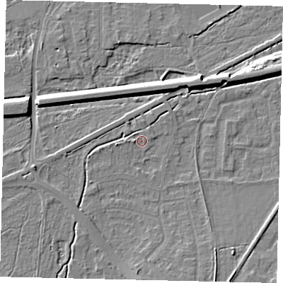 Shaded relief map of the ground around KT109AQ, computed from Environment Agency LiDAR. The ground here sits at about 12 m above sea level and falls 8 m across the surrounding 800 m. Surface water reaching this point runs off ground lying to the south, 3.6 m higher.