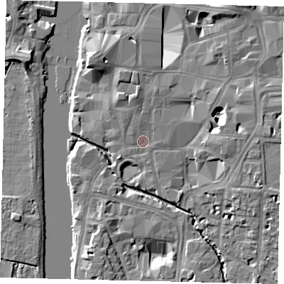 Shaded relief map of the ground around KT11BQ, computed from Environment Agency LiDAR. The ground here sits at about 7 m above sea level and falls 10 m across the surrounding 800 m. Surface water reaching this point runs off ground lying to the north, 2.1 m higher.