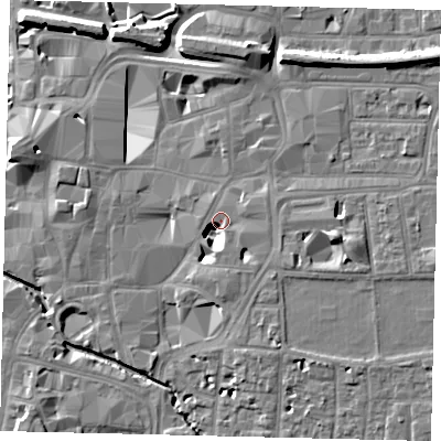 Shaded relief map of the ground around KT11DJ, computed from Environment Agency LiDAR. The ground here sits at about 9 m above sea level and falls 11 m across the surrounding 800 m. Surface water reaching this point runs off ground lying to the south-east, 7.7 m higher.