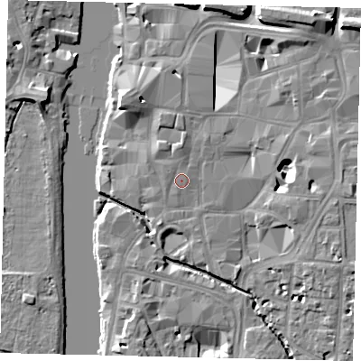 Shaded relief map of the ground around KT11JH, computed from Environment Agency LiDAR. The ground here sits at about 8 m above sea level and falls 11 m across the surrounding 800 m. Surface water reaching this point runs off ground lying to the north, 0.7 m higher.