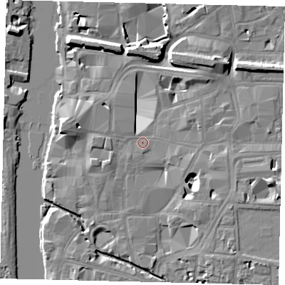 Shaded relief map of the ground around KT11NX, computed from Environment Agency LiDAR. The ground here sits at about 7 m above sea level and falls 11 m across the surrounding 800 m. Surface water reaching this point runs off ground lying to the east-south-east, 5.6 m higher.