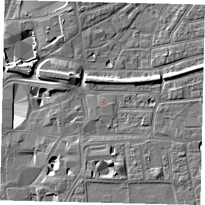 Shaded relief map of the ground around KT11QJ, computed from Environment Agency LiDAR. The ground here sits at about 9 m above sea level and falls 11 m across the surrounding 800 m. Surface water reaching this point runs off ground lying to the south-south-west, 0.5 m higher.
