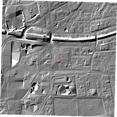 Shaded relief map of the ground around KT11QP, computed from Environment Agency LiDAR. The ground here sits at about 9 m above sea level and falls 11 m across the surrounding 800 m. Surface water reaching this point runs off ground lying to the south, 0.5 m higher.