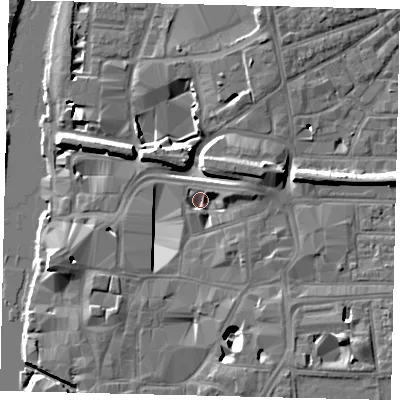 Shaded relief map of the ground around KT11TG, computed from Environment Agency LiDAR. The ground here sits at about 7 m above sea level and falls 11 m across the surrounding 800 m. Surface water reaching this point runs off ground lying to the east-north-east, 3.4 m higher.