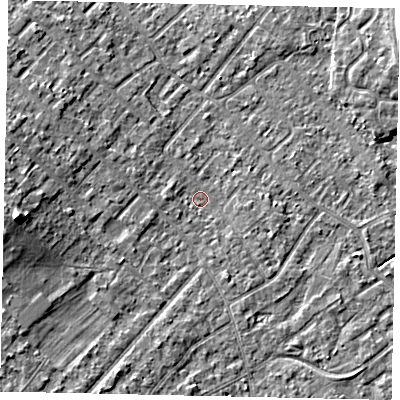 Shaded relief map of the ground around KT122AE, computed from Environment Agency LiDAR. The ground here sits at about 12 m above sea level and falls 10 m across the surrounding 800 m. Surface water reaching this point runs off ground lying to the west, 8.4 m higher.