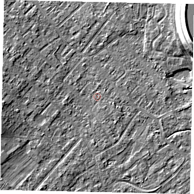 Shaded relief map of the ground around KT122AH, computed from Environment Agency LiDAR. The ground here sits at about 12 m above sea level and falls 15 m across the surrounding 800 m. Surface water reaching this point runs off ground lying to the west, 4.8 m higher.