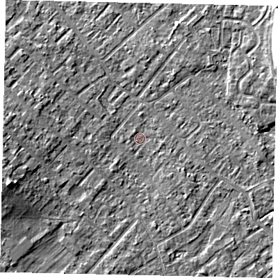 Shaded relief map of the ground around KT122AJ, computed from Environment Agency LiDAR. The ground here sits at about 12 m above sea level and falls 10 m across the surrounding 800 m. Surface water reaching this point runs off ground lying to the west-south-west, 9.0 m higher.