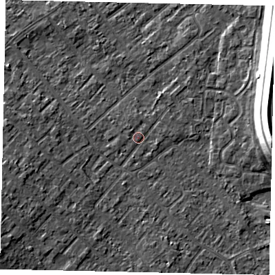 Shaded relief map of the ground around KT122AL, computed from Environment Agency LiDAR. The ground here sits at about 12 m above sea level and falls 15 m across the surrounding 800 m. Surface water reaching this point runs off ground lying to the west-south-west, 4.3 m higher.