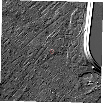 Shaded relief map of the ground around KT122AU, computed from Environment Agency LiDAR. The ground here sits at about 12 m above sea level and falls 15 m across the surrounding 800 m. The ground contributing surface water to this point lies to the west-north-west.