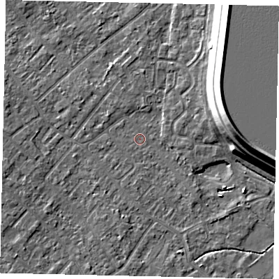 Shaded relief map of the ground around KT122AZ, computed from Environment Agency LiDAR. The ground here sits at about 12 m above sea level and falls 15 m across the surrounding 800 m. Surface water reaching this point runs off ground lying to the south-south-west, 1.6 m higher.