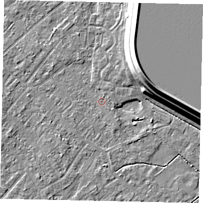 Shaded relief map of the ground around KT122BA, computed from Environment Agency LiDAR. The ground here sits at about 12 m above sea level and falls 15 m across the surrounding 800 m. Surface water reaching this point runs off ground lying to the north-east, 14.4 m higher.