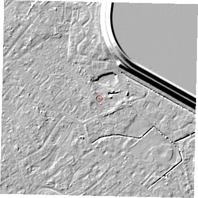 Shaded relief map of the ground around KT122BB, computed from Environment Agency LiDAR. The ground here sits at about 12 m above sea level and falls 15 m across the surrounding 800 m. Surface water reaching this point runs off ground lying to the east, 3.8 m higher.
