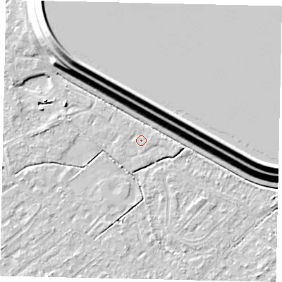 Shaded relief map of the ground around KT122BE, computed from Environment Agency LiDAR. The ground here sits at about 12 m above sea level and falls 15 m across the surrounding 800 m. Surface water reaching this point runs off ground lying to the east-south-east, 0.8 m higher.
