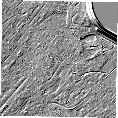 Shaded relief map of the ground around KT122BJ, computed from Environment Agency LiDAR. The ground here sits at about 12 m above sea level and falls 15 m across the surrounding 800 m. Surface water reaching this point runs off ground lying to the south-south-west, 1.5 m higher.