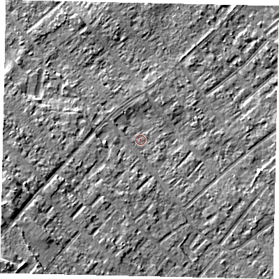 Shaded relief map of the ground around KT122BT, computed from Environment Agency LiDAR. The ground here sits at about 11 m above sea level and falls 10 m across the surrounding 800 m. Surface water reaching this point runs off ground lying to the west-south-west, 5.1 m higher.