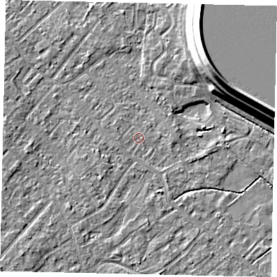 Shaded relief map of the ground around KT122DE, computed from Environment Agency LiDAR. The ground here sits at about 12 m above sea level and falls 15 m across the surrounding 800 m. Surface water reaching this point runs off ground lying to the south-south-west, 1.6 m higher.