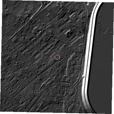 Shaded relief map of the ground around KT122DH, computed from Environment Agency LiDAR. The ground here sits at about 12 m above sea level and falls 16 m across the surrounding 800 m. Surface water reaching this point runs off ground lying to the south-south-west, 1.2 m higher.