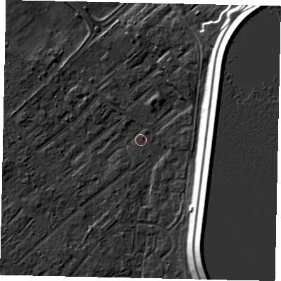 Shaded relief map of the ground around KT122DJ, computed from Environment Agency LiDAR. The ground here sits at about 12 m above sea level and falls 16 m across the surrounding 800 m. Surface water reaching this point runs off ground lying to the south-east, 14.6 m higher.