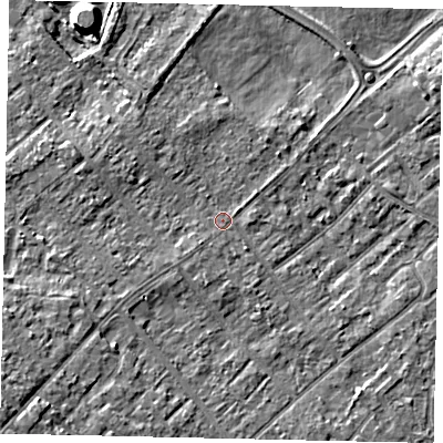 Shaded relief map of the ground around KT122DX, computed from Environment Agency LiDAR. The ground here sits at about 11 m above sea level and falls 8 m across the surrounding 800 m. Surface water reaching this point runs off ground lying to the south-south-west, 1.1 m higher.