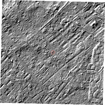 Shaded relief map of the ground around KT122HG, computed from Environment Agency LiDAR. The ground here sits at about 12 m above sea level and falls 6 m across the surrounding 800 m. Surface water reaching this point runs off ground lying to the west-south-west, 3.6 m higher.