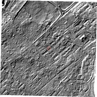 Shaded relief map of the ground around KT122HL, computed from Environment Agency LiDAR. The ground here sits at about 11 m above sea level and falls 7 m across the surrounding 800 m. Surface water reaching this point runs off ground lying to the south-east, 5.6 m higher.
