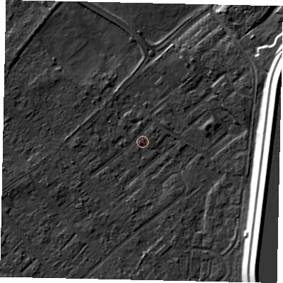 Shaded relief map of the ground around KT122HN, computed from Environment Agency LiDAR. The ground here sits at about 11 m above sea level and falls 16 m across the surrounding 800 m. Surface water reaching this point runs off ground lying to the east-south-east, 15.0 m higher.