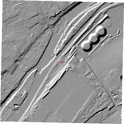 Shaded relief map of the ground around KT122JB, computed from Environment Agency LiDAR. The ground here sits at about 9 m above sea level and falls 12 m across the surrounding 800 m. Surface water reaching this point runs off ground lying to the east-south-east, 4.2 m higher.