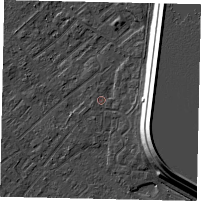 Shaded relief map of the ground around KT122JN, computed from Environment Agency LiDAR. The ground here sits at about 12 m above sea level and falls 15 m across the surrounding 800 m. Surface water reaching this point runs off ground lying to the east-south-east, 13.8 m higher.