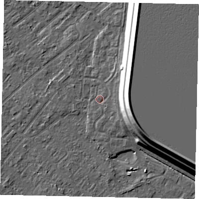 Shaded relief map of the ground around KT122LS, computed from Environment Agency LiDAR. The ground here sits at about 13 m above sea level and falls 15 m across the surrounding 800 m. Surface water reaching this point runs off ground lying to the east-south-east, 13.5 m higher.