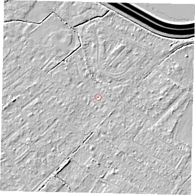 Shaded relief map of the ground around KT123LP, computed from Environment Agency LiDAR. The ground here sits at about 12 m above sea level and falls 15 m across the surrounding 800 m. Surface water reaching this point runs off ground lying to the south-south-west, 2.4 m higher.