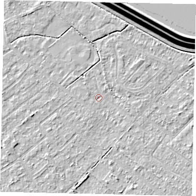 Shaded relief map of the ground around KT123LQ, computed from Environment Agency LiDAR. The ground here sits at about 12 m above sea level and falls 15 m across the surrounding 800 m. Surface water reaching this point runs off ground lying to the south, 2.4 m higher.