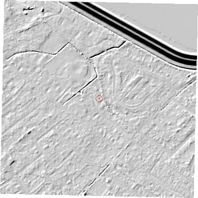 Shaded relief map of the ground around KT123LR, computed from Environment Agency LiDAR. The ground here sits at about 12 m above sea level and falls 15 m across the surrounding 800 m. Surface water reaching this point runs off ground lying to the south, 2.4 m higher.