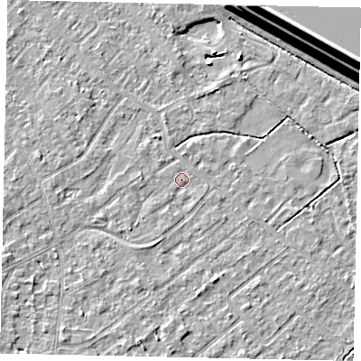 Shaded relief map of the ground around KT123NX, computed from Environment Agency LiDAR. The ground here sits at about 12 m above sea level and falls 15 m across the surrounding 800 m. Surface water reaching this point runs off ground lying to the west-south-west, 2.1 m higher.