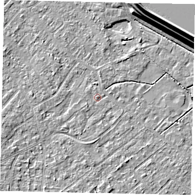 Shaded relief map of the ground around KT123TD, computed from Environment Agency LiDAR. The ground here sits at about 12 m above sea level and falls 15 m across the surrounding 800 m. Surface water reaching this point runs off ground lying to the south-west, 1.0 m higher.