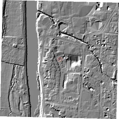 Shaded relief map of the ground around KT12AR, computed from Environment Agency LiDAR. The ground here sits at about 7 m above sea level and falls 9 m across the surrounding 800 m. Surface water reaching this point runs off ground lying to the south-south-east, 6.7 m higher.