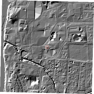 Shaded relief map of the ground around KT12FQ, computed from Environment Agency LiDAR. The ground here sits at about 8 m above sea level and falls 10 m across the surrounding 800 m. Surface water reaching this point runs off ground lying to the east, 2.5 m higher.