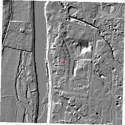 Shaded relief map of the ground around KT12JU, computed from Environment Agency LiDAR. The ground here sits at about 9 m above sea level and falls 7 m across the surrounding 800 m. Surface water reaching this point runs off ground lying to the north-north-west, 0.7 m higher.