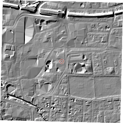 Shaded relief map of the ground around KT12PD, computed from Environment Agency LiDAR. The ground here sits at about 9 m above sea level and falls 11 m across the surrounding 800 m. Surface water reaching this point runs off ground lying to the south-east, 2.3 m higher.