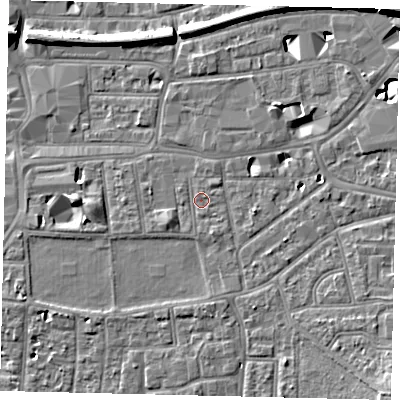 Shaded relief map of the ground around KT12QA, computed from Environment Agency LiDAR. The ground here sits at about 9 m above sea level and falls 10 m across the surrounding 800 m. Surface water reaching this point runs off ground lying to the south, 0.6 m higher.