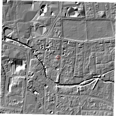 Shaded relief map of the ground around KT12QN, computed from Environment Agency LiDAR. The ground here sits at about 9 m above sea level and falls 10 m across the surrounding 800 m. Surface water reaching this point runs off ground lying to the north-east, 2.7 m higher.