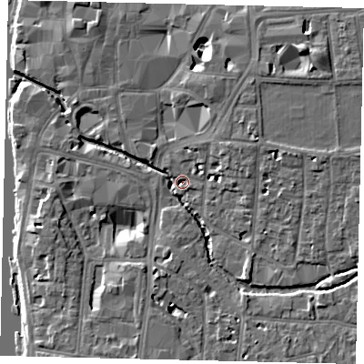 Shaded relief map of the ground around KT12QT, computed from Environment Agency LiDAR. The ground here sits at about 6 m above sea level and falls 10 m across the surrounding 800 m. Surface water reaching this point runs off ground lying to the east-north-east, 8.7 m higher.
