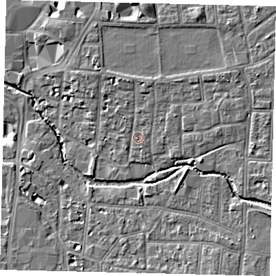 Shaded relief map of the ground around KT12RD, computed from Environment Agency LiDAR. The ground here sits at about 9 m above sea level and falls 10 m across the surrounding 800 m. Surface water reaching this point runs off ground lying to the north, 1.8 m higher.